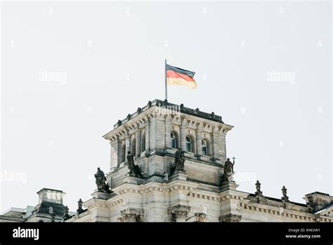 German Flag Over The Reichstag Building In Berlin In Germany Stock