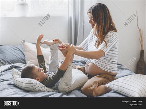 Pregnant Mom Playing Image And Photo Free Trial Bigstock