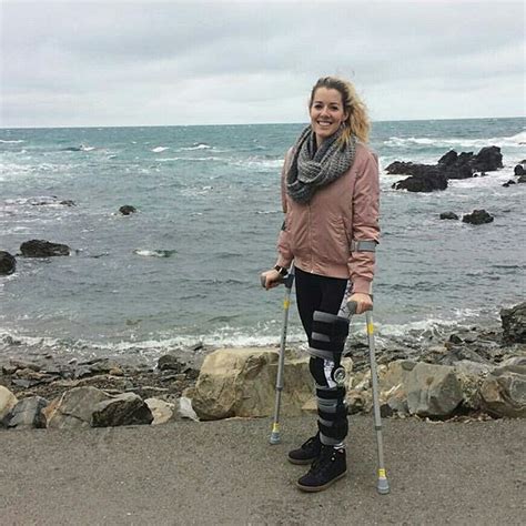 Woman On Crutches With Legbrace