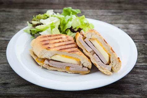 Serve topped with black beans, avocado and a squeeze of lime. Eclectic Recipes Apple Cheddar and Pork Tenderloin Panini | Eclectic Recipes