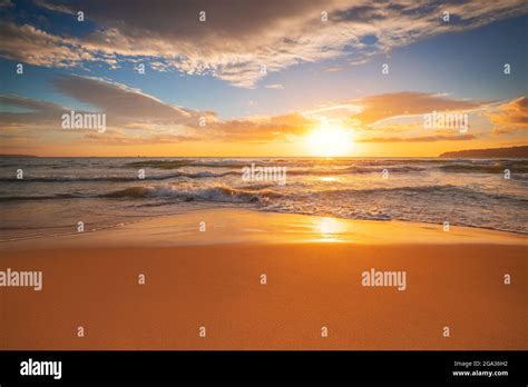 Beach Sunrise Over The Tropical Sea Stock Photo Alamy