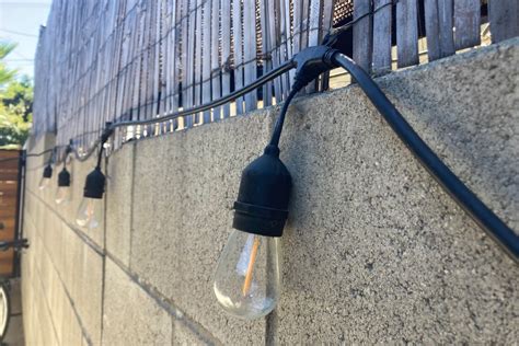 How To Hang Outdoor String Lights And Make Them Look Good Wirecutter
