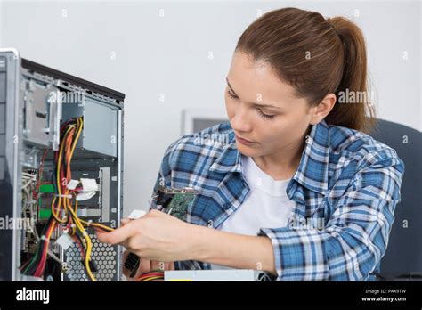 Female Pc Technician Fixing A Computer Stock Photo Alamy