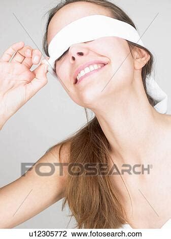 Woman Blindfolded Smiling Stock Image U Fotosearch