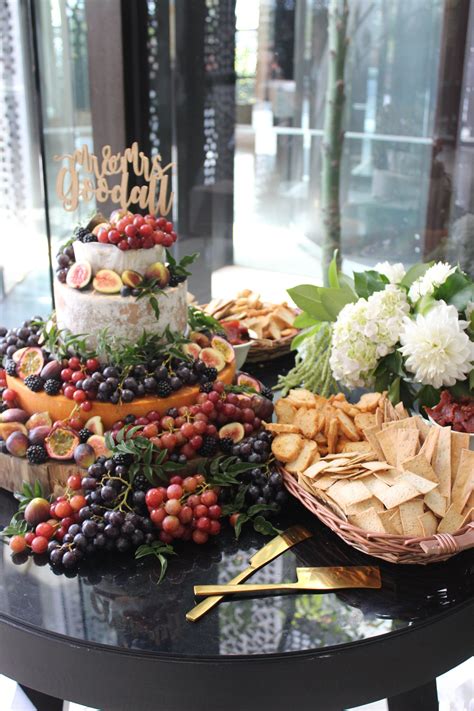 Cheese Towers With Fruits And Crackers Regnier Cakes