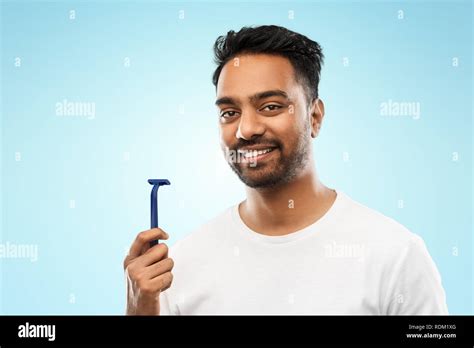 Indian Man Shaving Beard With Razor Blade Stock Photo Alamy