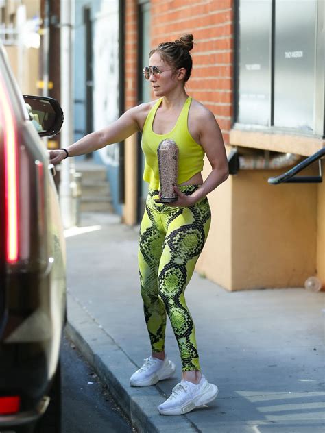 Jennifer Lopez Takes Athleisure To The Next Level In A Bold Neon Yellow