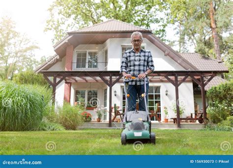 Elderly Man Mowing The Lawn Stock Image Image Of Grass House 156930073