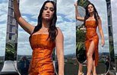 Katy Perry Shows Off Sensational Legs In Shimmering Orange Split Dress