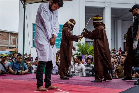 Indonesian Gay Couple Caned 85 Times Each In Front Of Huge Jeering Crowd In Aceh Ibtimes Uk