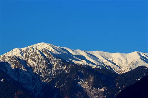 Gambar Pemandangan Gunung Salju Musim Dingin Awan Langit Sinar