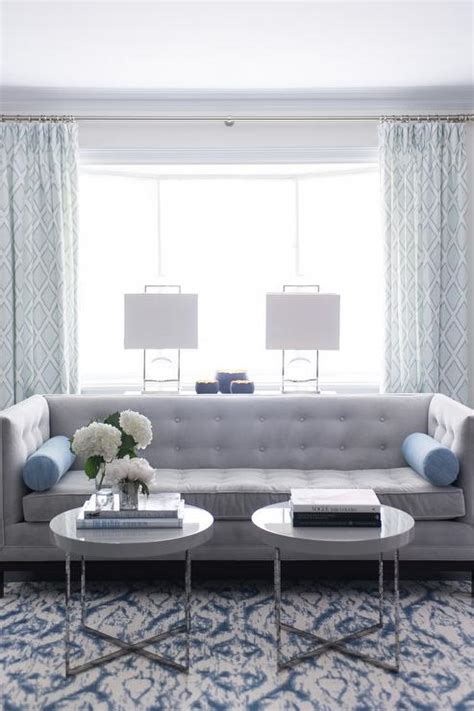 Jeden tag werden tausende neue, hochwertige bilder hinzugefügt. Gray Tufted High back Sofa with Blue Bolster Pillows ...