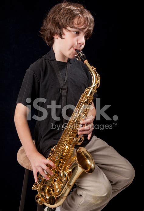 Boy Playing Saxophone Stock Photo Royalty Free Freeimages