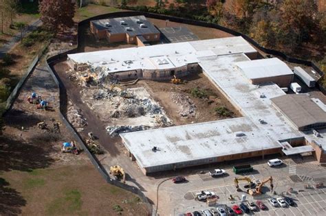 Almost A Year After Massacre Newtown Begins Razing Sandy Hook School