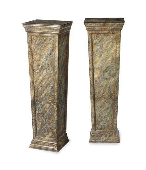A Pair Of Faux Marble Pedestals