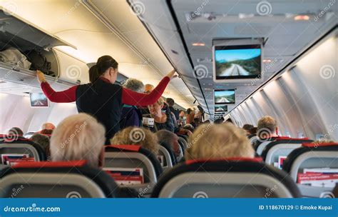 Passengers On The Plane Editorial Stock Image Image Of Cabin 118670129