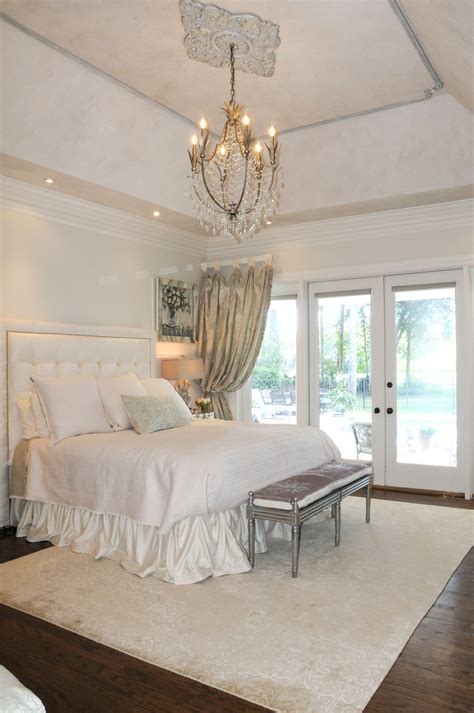 The High Ceilings In This Master Bedroom Called For A Focal Chandelier