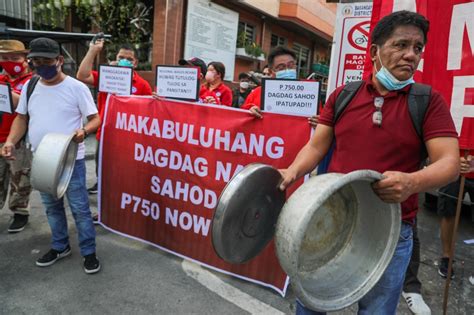 wage hike pushed abs cbn news