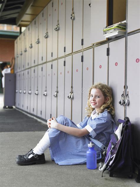 Girl Sitting Against School Lockers Stock Photos Free And Royalty Free