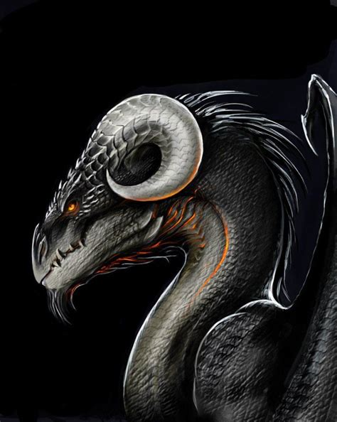 A Black And White Dragon With Orange Eyes On Its Head Sitting In The Dark