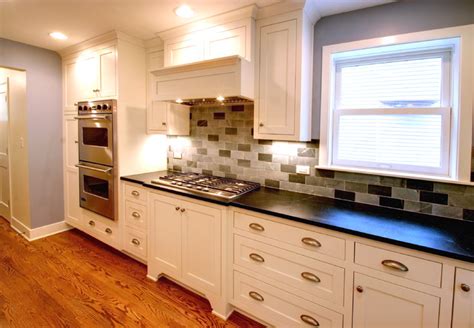 Even today, the shaker style is the most common style in cabinet doors. Craftsman style cabinets,oak hardwood flooring - Traditional - Kitchen - Chicago - by RS2 Architects