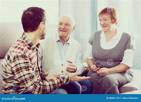 Grandparents And Grandson Talk Stock Photo Image Of Conversation