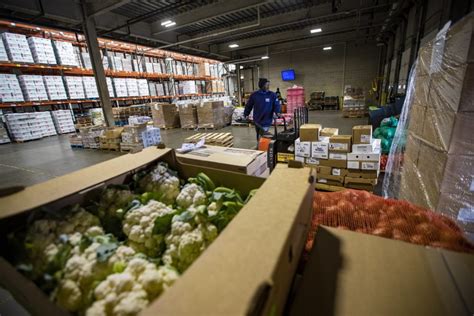 People must register in advance to pick up a food box. 1 Million People In Mass. Are Food Insecure | Radio Boston