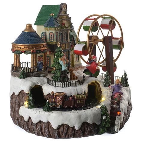 Animated Christmas village with music, ferris wheel and ...
