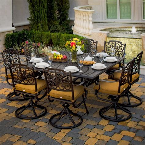 Lounge on comfortable padded cushions that have. Evangeline 8-Person Cast Aluminum Patio Dining Set ...