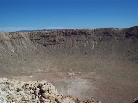 Meteor crater is a meteorite impact crater approximately 37 miles (60 km) east of flagstaff and 18 miles (29 km) west of winslow in the northern arizona desert of the united states. Sci/Why: Arizona Meteor Crater
