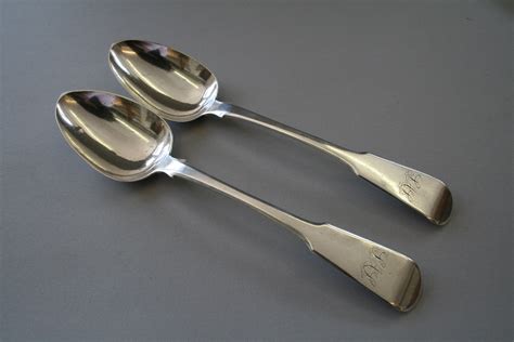 A pair of Georgian silver serving spoons 1820 - Williams Antiques