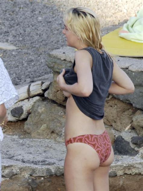 thumbs pro toplessbeachcelebs Dakota JohnsonÂ swimming topless in Pantelleria ItalyÂ October