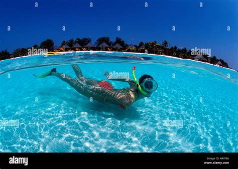 Snorkeling Woman Near Maldives Island Kuredu Malediven Maldives Stock