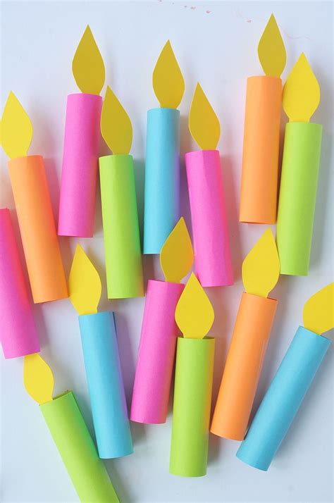 Several Different Colored Candles Are Arranged In The Shape Of