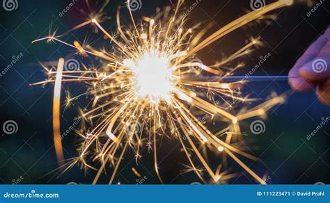 Closeup Of A Person Holding A Sparkler At Night Stock Image Image Of