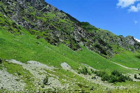 Summer Mountains Green Grass And Blue Sky Landscape Caucasus Mountains