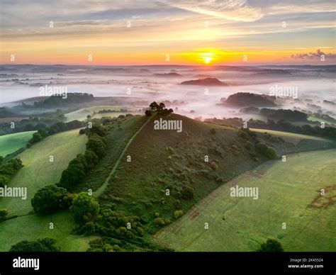 View From The Air Of A Misty Autumn Sunrise At Colmers Hill At