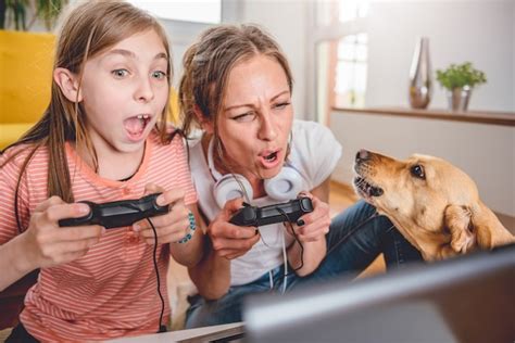 Premium Photo Mother And Daughter Playing Video Games