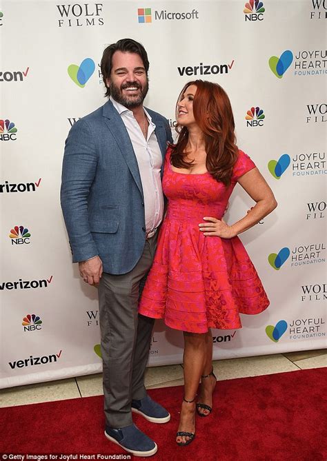 Poppy Montgomery Shares A Kiss With Husband Shawn Sanford On The Red