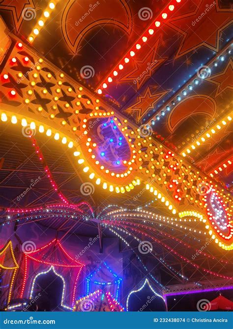 Amusement Park Fun Ride With Bright Lights Stock Photo Image Of Font