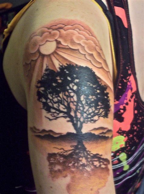 TATTOOS DESIGNS 2012: Sun Tattoos