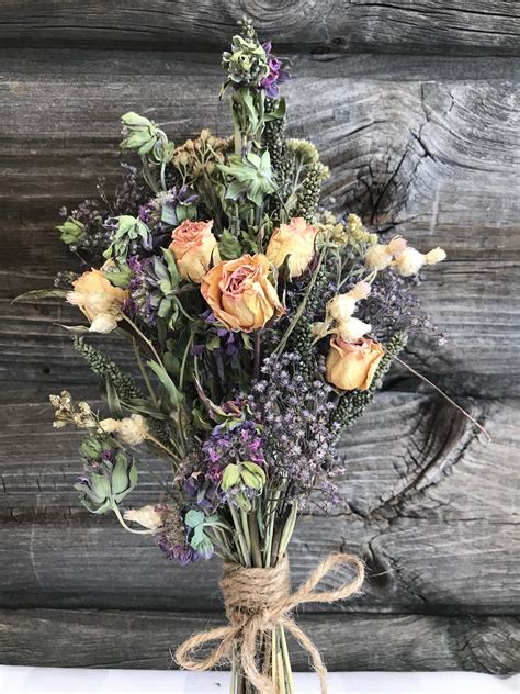 Then just hang wands in small bunches secured with twine upside down to dry in a dark, warm. Hold Bunch Flowers Upside Down - How To Make Dried Flowers ...