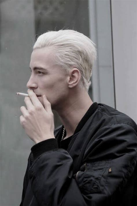 It has a brassy orange on the roots. Bleached Hair for Men: Achieve the Platinum Blonde Look
