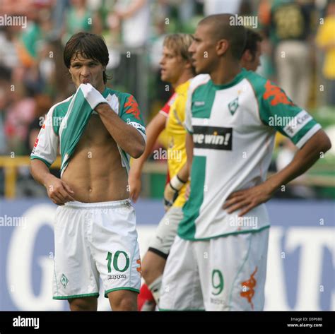 Bremen Players Diego L And Mohamed Zidan Wipe Their Sweat After