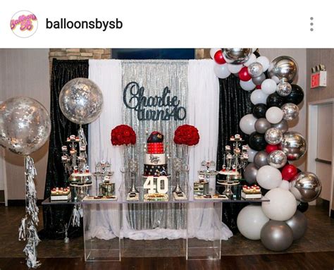 An Image Of A Table With Balloons And Cake For A 30th Birthday Or