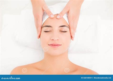 Attractive Young Woman Receiving Facial Massage At Spa Center Stock Image Image Of 56818859