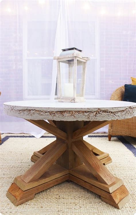 Polish up a beautiful slab of wood, add some retro hairpin legs and voila! Round Concrete Top Outdoor Coffee Table