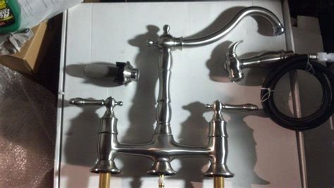Moen 7594esrs arbor motionsense kitchen faucet design isn't the cleanest on this review, but it offers some appealing finish. 7 Pics Pegasus Glacier Bay Lyndhurst Bridge Kitchen Faucet ...