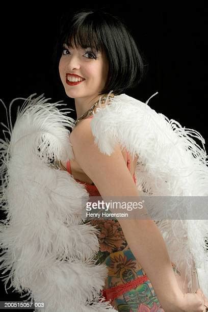 Burlesque Feather Fans Photos And Premium High Res Pictures Getty Images