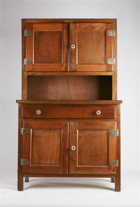 A piece of furniture or a space for storing things, with a door or doors and usually with…. Hoosier cabinet - Wikipedia